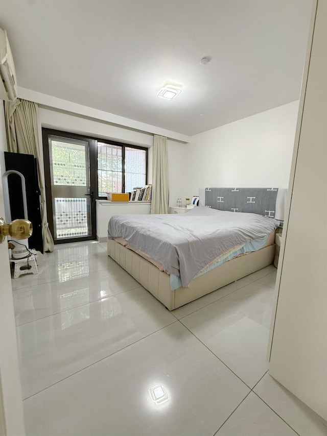 149-17 Sanford Ave, Flushing, NY 11355 - bedroom with light tile patterned floors and a wall mounted air conditioner