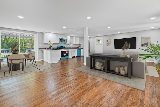70 Robinson Ave, Brookhaven, NY 11763 - living area with recessed lighting and wood finished floors