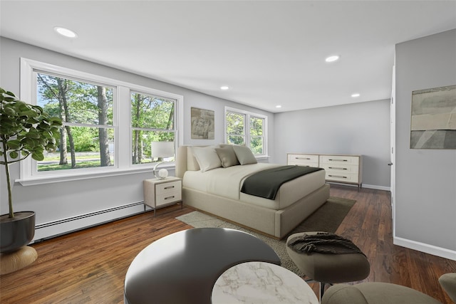 70 Robinson Ave, Brookhaven, NY 11763 - bedroom with a baseboard heating unit, wood finished floors, and recessed lighting