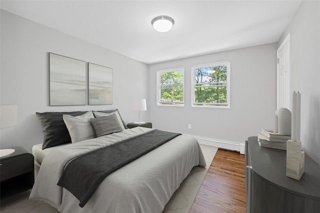 70 Robinson Ave, Brookhaven, NY 11763 - bedroom featuring wood finished floors and baseboards