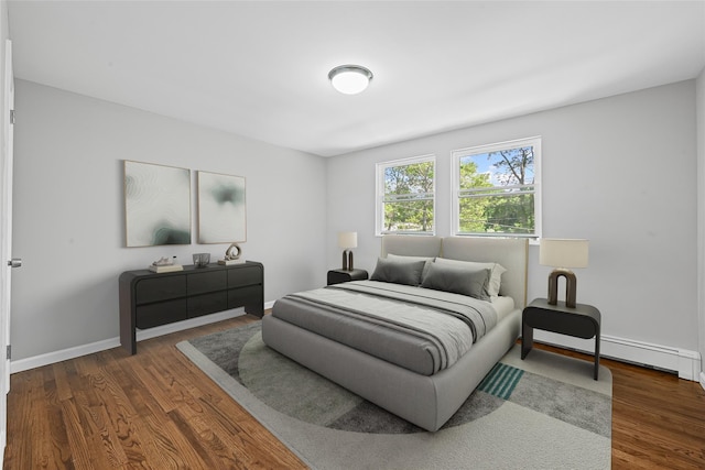 70 Robinson Ave, Brookhaven, NY 11763 - bedroom with a baseboard radiator and dark wood finished floors