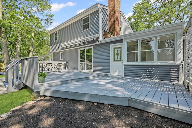 70 Robinson Ave, Brookhaven, NY 11763 - back of property with a chimney and a deck