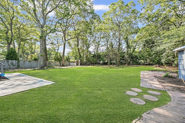 70 Robinson Ave, Brookhaven, NY 11763 - fenced backyard featuring a patio area