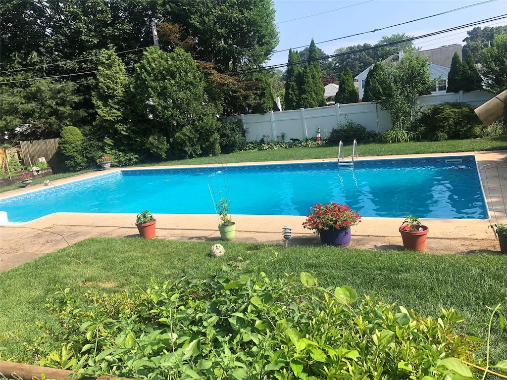 3 Woods Ln, Centereach, NY 11720 - view of swimming pool with a fenced backyard