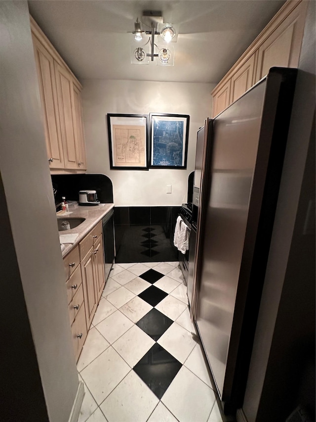 1 Birchwood Ct Unit 3H, Mineola, NY 11501 - kitchen with stainless steel appliances, light countertops, and light brown cabinets