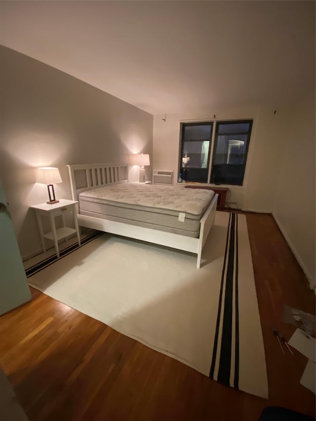 1 Birchwood Ct Unit 3H, Mineola, NY 11501 - bedroom with wood finished floors