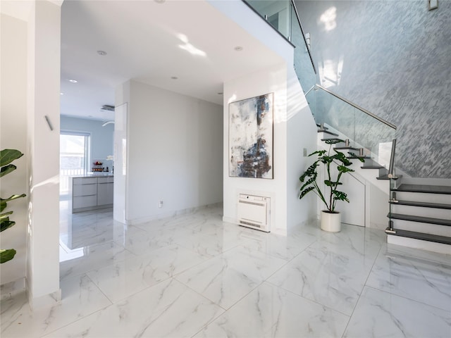 85 Erie Ave, Atlantic Beach, NY 11509 - stairs with marble finish floors and recessed lighting
