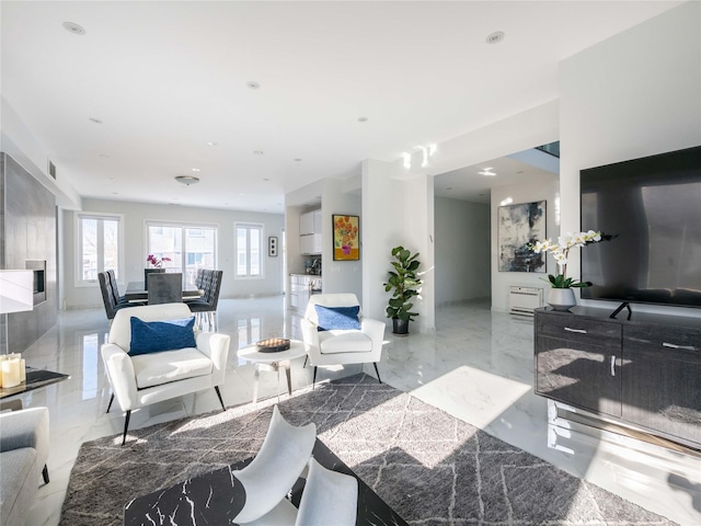 85 Erie Ave, Atlantic Beach, NY 11509 - living area featuring marble tiled flooring and recessed lighting