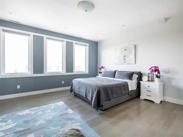 85 Erie Ave, Atlantic Beach, NY 11509 - bedroom featuring wood finished floors