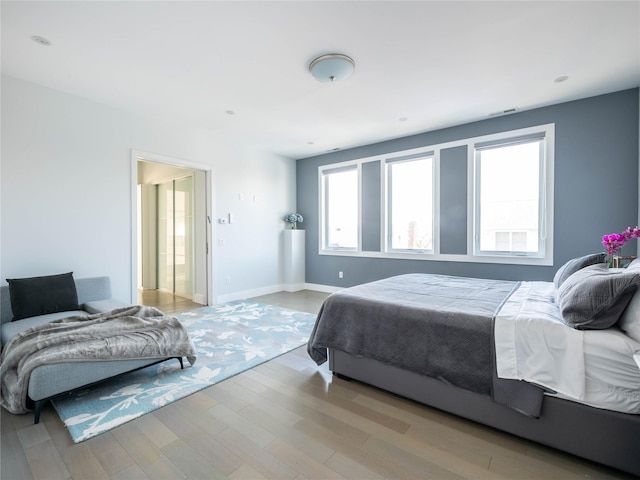 85 Erie Ave, Atlantic Beach, NY 11509 - bedroom featuring wood finished floors and baseboards
