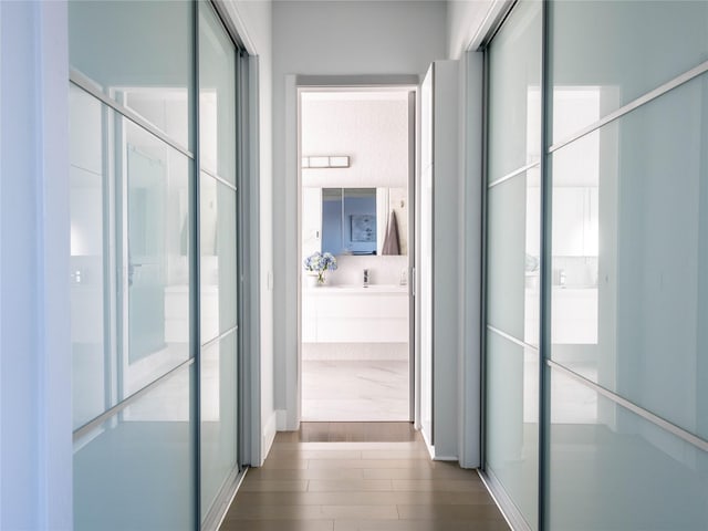 85 Erie Ave, Atlantic Beach, NY 11509 - hallway featuring dark wood-style flooring