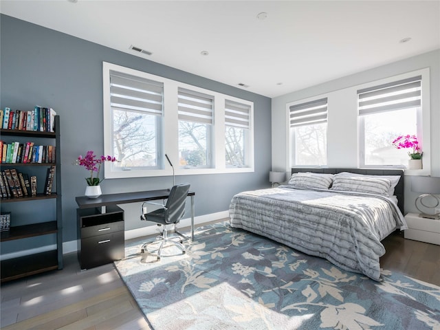 85 Erie Ave, Atlantic Beach, NY 11509 - bedroom with wood finished floors and an office area