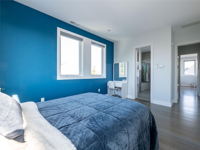 85 Erie Ave, Atlantic Beach, NY 11509 - bedroom with wood finished floors and baseboards