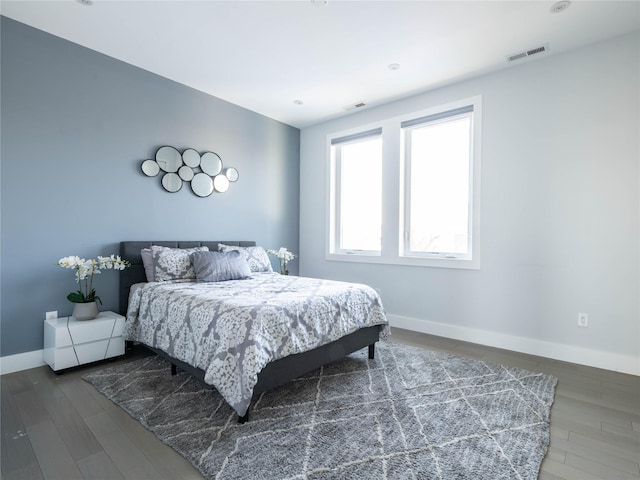 85 Erie Ave, Atlantic Beach, NY 11509 - bedroom with baseboards and wood finished floors