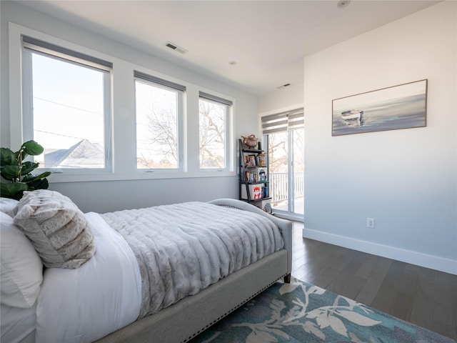 85 Erie Ave, Atlantic Beach, NY 11509 - bedroom featuring access to outside and dark wood-type flooring