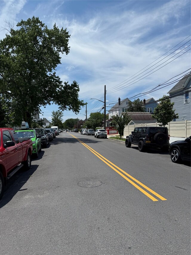 9030 202nd St, Hollis, NY 11423 - view of asphalt street with street lighting