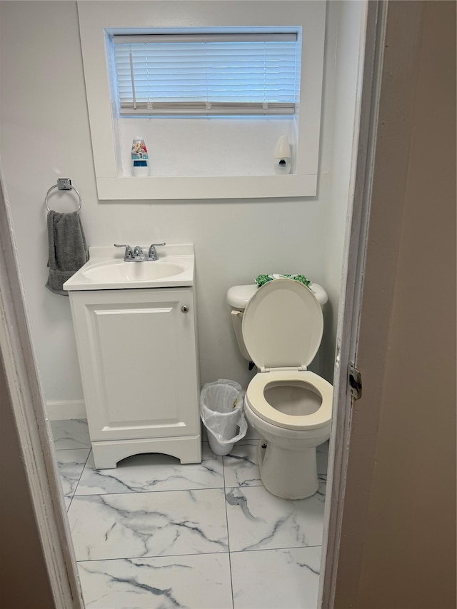 9030 202nd St, Hollis, NY 11423 - bathroom with vanity and marble look tiles