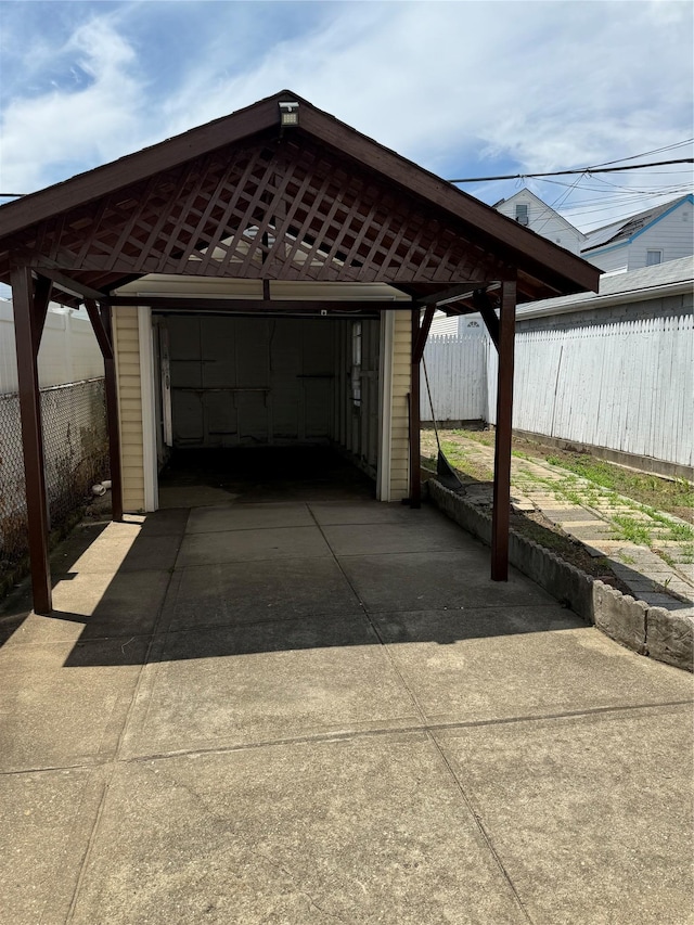 9030 202nd St, Hollis, NY 11423 - view of car parking with concrete driveway