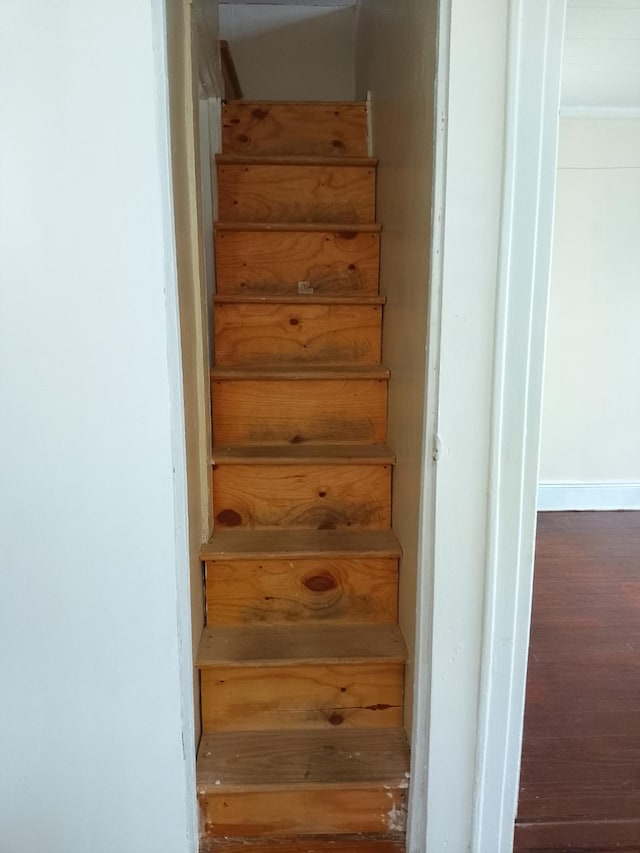 9030 202nd St, Hollis, NY 11423 - stairway with wood finished floors and baseboards
