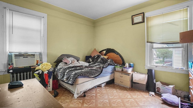 85-35 Parsons Blvd, Briarwood, NY 11435 - bedroom with cooling unit and light floors