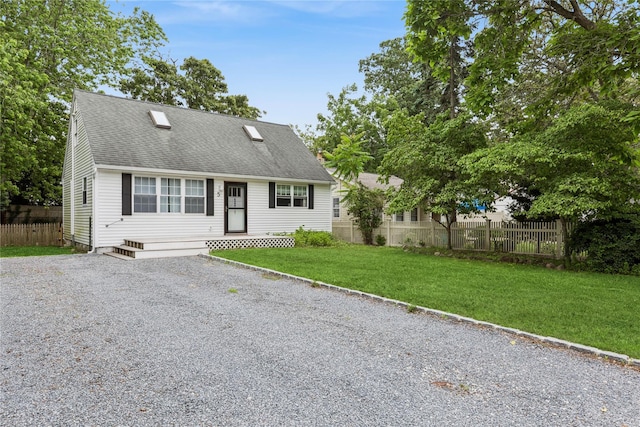 5 Coolidge Rd, Hampton Bays, NY 11946 - view of front of property with gravel driveway and a shingled roof