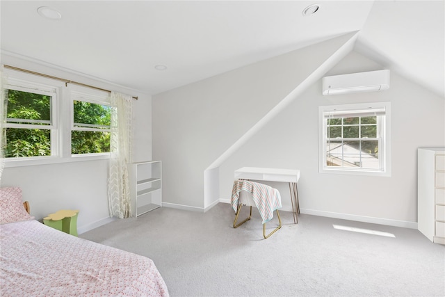 5 Coolidge Rd, Hampton Bays, NY 11946 - carpeted bedroom with a wall mounted AC and lofted ceiling