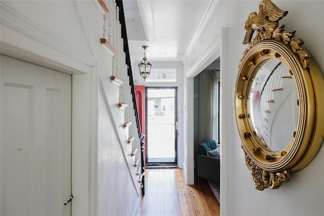 24 8th St, Hudson, NY 12534 - foyer featuring light wood-type flooring and ornamental molding