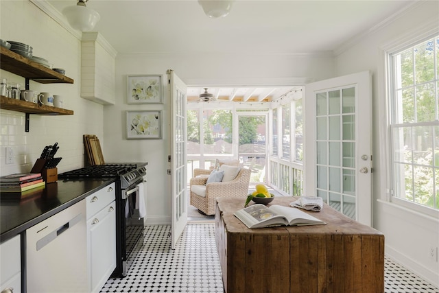 24 8th St, Hudson, NY 12534 - kitchen with dishwasher, stainless steel gas stove, light flooring, dark countertops, and tasteful backsplash