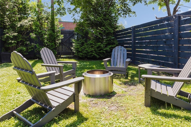 24 8th St, Hudson, NY 12534 - fenced backyard with an outdoor fire pit