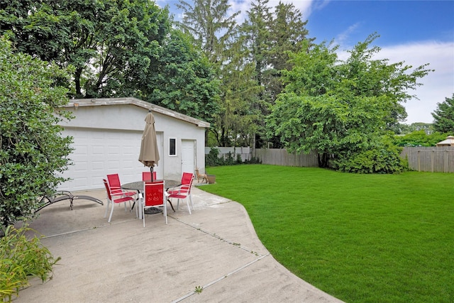 181 Walnut St, Lynbrook, NY 11563 - fenced backyard featuring an outdoor structure, a patio, and outdoor dining space