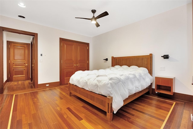 181 Walnut St, Lynbrook, NY 11563 - bedroom featuring wood finished floors, a closet, and ceiling fan