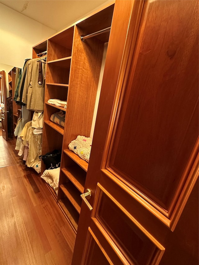 181 Walnut St, Lynbrook, NY 11563 - walk in closet with wood finished floors