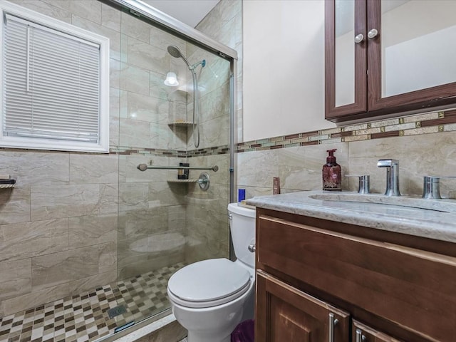 453 Christopher Ave, Brooklyn, NY 11212 - bathroom featuring vanity, a stall shower, and tile walls