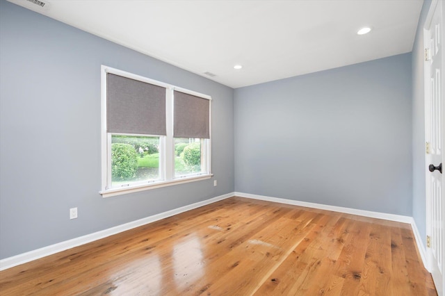 31-33 Dunlop Ct, Commack, NY 11725 - unfurnished room featuring light wood finished floors and recessed lighting