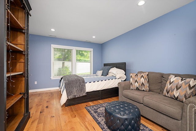 31-33 Dunlop Ct, Commack, NY 11725 - bedroom with wood finished floors and recessed lighting