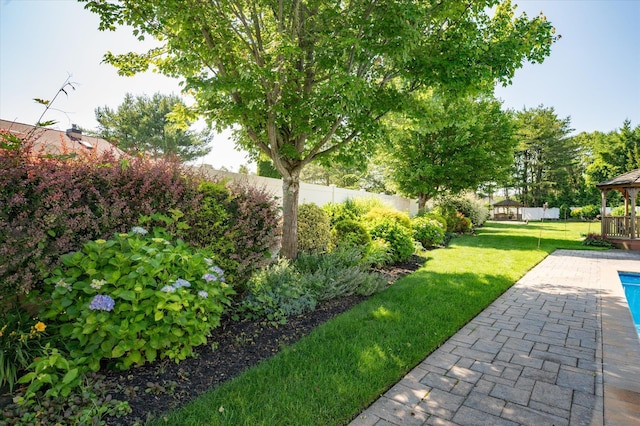 31-33 Dunlop Ct, Commack, NY 11725 - fenced backyard featuring a gazebo