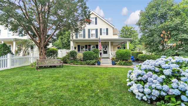 16 Clement St, Glen Cove, NY 11542 - farmhouse-style home featuring covered porch