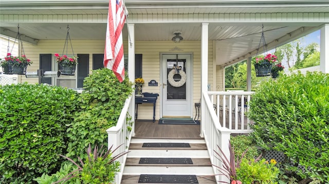 16 Clement St, Glen Cove, NY 11542 - property entrance featuring a porch
