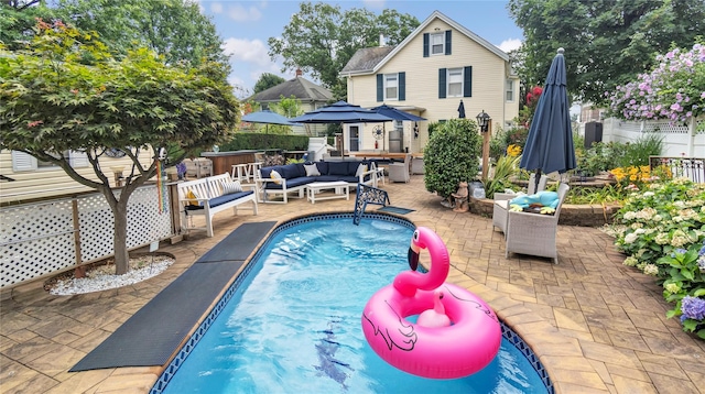 16 Clement St, Glen Cove, NY 11542 - view of pool featuring an outdoor living space and a patio