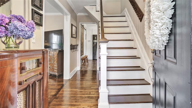 16 Clement St, Glen Cove, NY 11542 - stairs with crown molding and wood finished floors