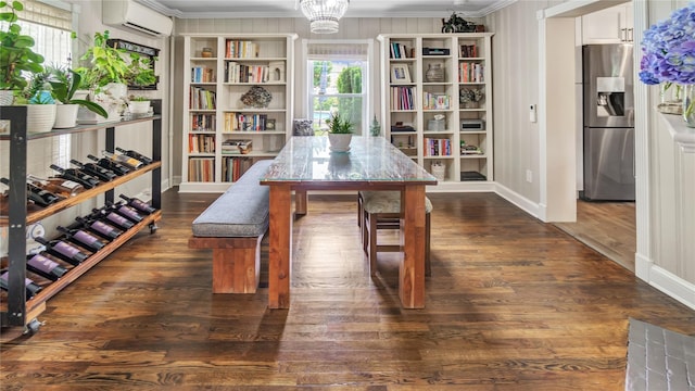 16 Clement St, Glen Cove, NY 11542 - dining area with a wall mounted air conditioner, crown molding, dark wood-style flooring, and built in shelves