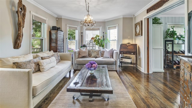 16 Clement St, Glen Cove, NY 11542 - living area featuring dark wood finished floors, ornamental molding, and a chandelier