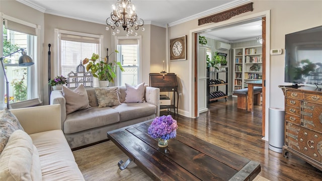 16 Clement St, Glen Cove, NY 11542 - living room featuring a wall mounted AC, wood finished floors, healthy amount of natural light, a chandelier, and ornamental molding