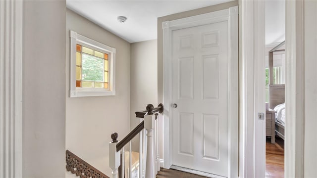 16 Clement St, Glen Cove, NY 11542 - hall featuring dark wood finished floors and an upstairs landing
