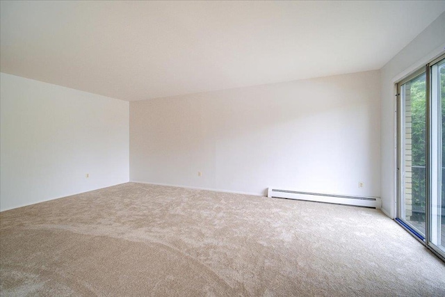 1109 Cherry Hill Dr Unit 1109, Poughkeepsie, NY 12603 - empty room featuring a baseboard heating unit and carpet floors