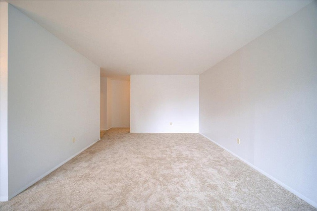 1109 Cherry Hill Dr Unit 1109, Poughkeepsie, NY 12603 - unfurnished room featuring light colored carpet and baseboards