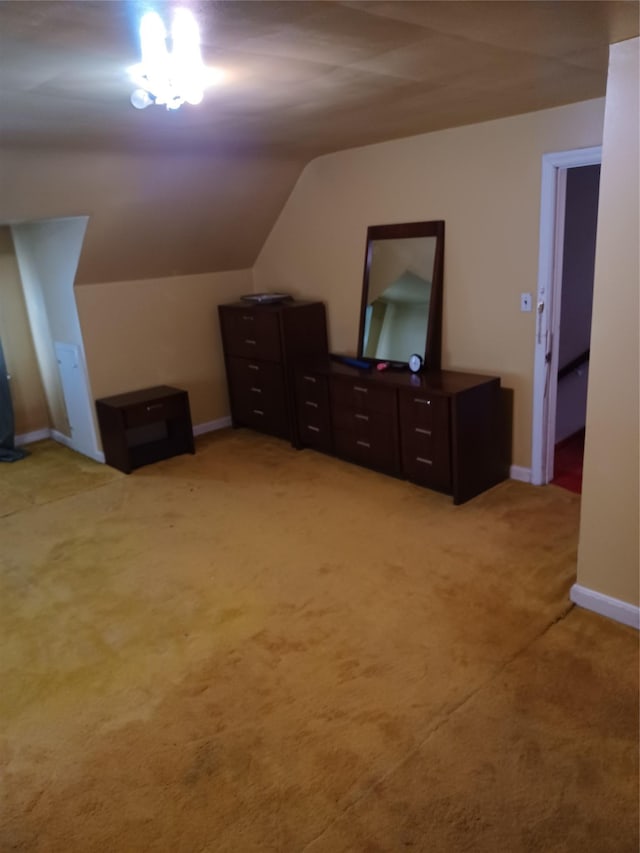 118 Allen St, Hempstead, NY 11550 - bedroom with light colored carpet and vaulted ceiling