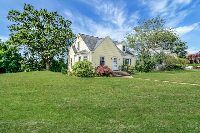 4 Jones St N, Patchogue, NY 11772 - view of front facade with a front yard