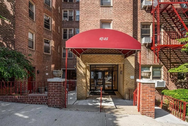 67-25 Clyde St Unit 5D, Forest Hills, NY 11375 - view of apartment building / complex featuring cooling unit