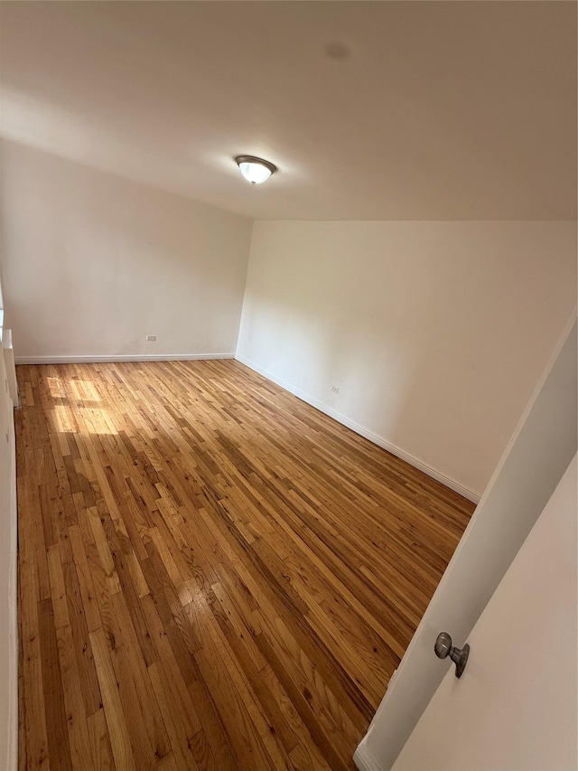 67-25 Clyde St Unit 5D, Forest Hills, NY 11375 - empty room featuring hardwood / wood-style floors and baseboards